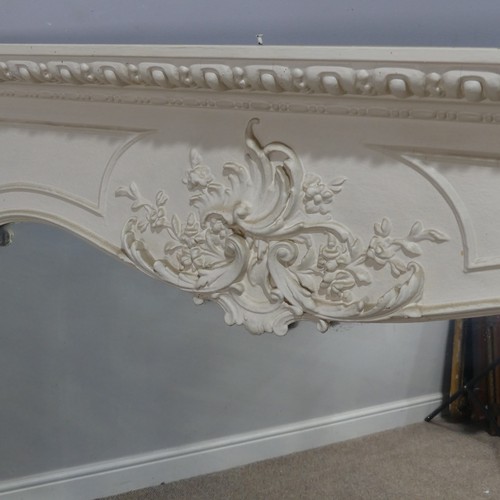 446 - A large antique style painted overmantle Mirror, with a moulded and carved pediment flanked by colum... 