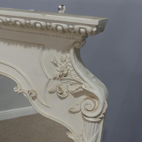 446 - A large antique style painted overmantle Mirror, with a moulded and carved pediment flanked by colum... 