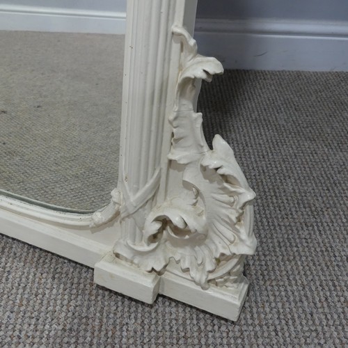 446 - A large antique style painted overmantle Mirror, with a moulded and carved pediment flanked by colum... 