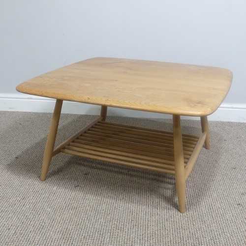 397 - An Ercol windsor model 767 elm square coffee Table, with square top over splayed beach supports join... 