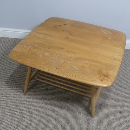 397 - An Ercol windsor model 767 elm square coffee Table, with square top over splayed beach supports join... 