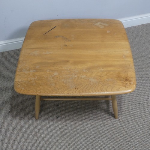 397 - An Ercol windsor model 767 elm square coffee Table, with square top over splayed beach supports join... 