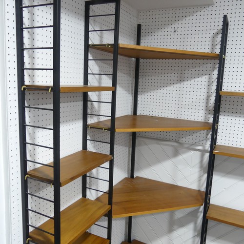 398 - A mid 20th century teak Ladderax corner shelving System / Unit, comprising of four black metal ladde... 