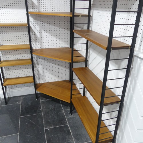 398 - A mid 20th century teak Ladderax corner shelving System / Unit, comprising of four black metal ladde... 