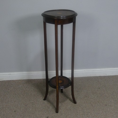 450 - An Edwardian mahogany and inlaid Plant Stand, of circular form, H 99 cm, together with a woven magaz... 