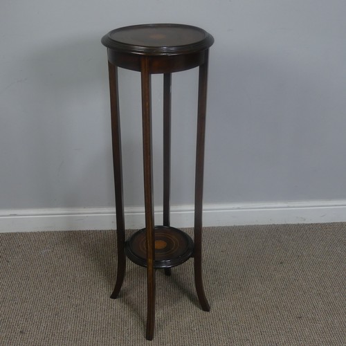 450 - An Edwardian mahogany and inlaid Plant Stand, of circular form, H 99 cm, together with a woven magaz... 