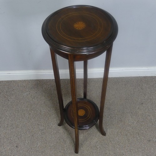 450 - An Edwardian mahogany and inlaid Plant Stand, of circular form, H 99 cm, together with a woven magaz... 