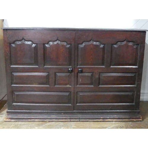 456 - A large 18th century oak panelled Cupboard, raised on moulded plinth base, W 141 cm x H 95 cm x D 60... 