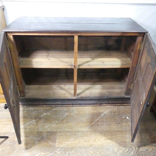 456 - A large 18th century oak panelled Cupboard, raised on moulded plinth base, W 141 cm x H 95 cm x D 60... 