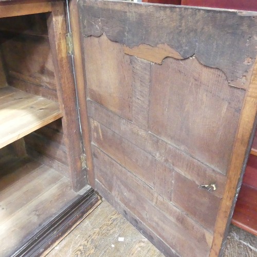 456 - A large 18th century oak panelled Cupboard, raised on moulded plinth base, W 141 cm x H 95 cm x D 60... 