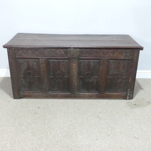 457 - A 17th century and later oak Coffer, rectangular plank top over 17th century carved panels, raised o... 