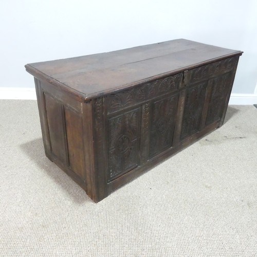 457 - A 17th century and later oak Coffer, rectangular plank top over 17th century carved panels, raised o... 