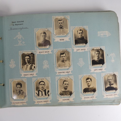 192 - A Godfrey Phillips Ltd. 'Photos of Football Players' card album, 1922/1923, containing Pinnace photo... 