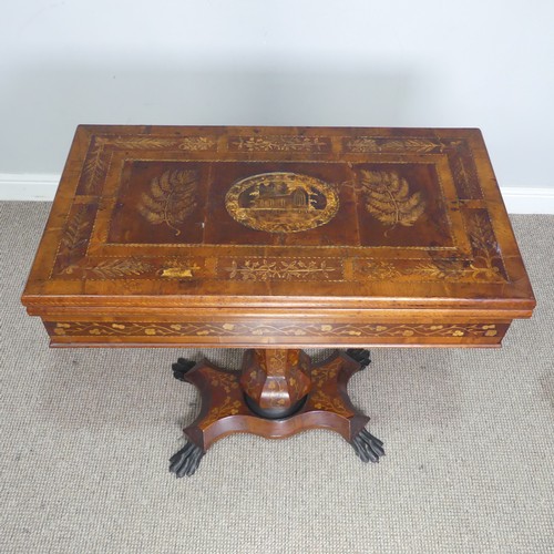467 - A 19th century Irish Killarney marquetry and yew games Table, hinged rectangular top inlaid with an ... 