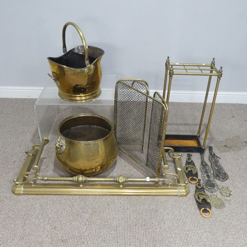 473 - An early 20th century brass Stick Stand, H 63 cm, together with a brass fender, coal bucket, large p... 