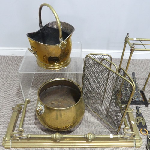 473 - An early 20th century brass Stick Stand, H 63 cm, together with a brass fender, coal bucket, large p... 