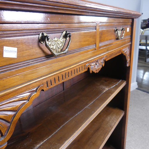 474 - An Edwardian mahogany open Bookcase, two short frieze drawers over two open shelves, raised on plint... 