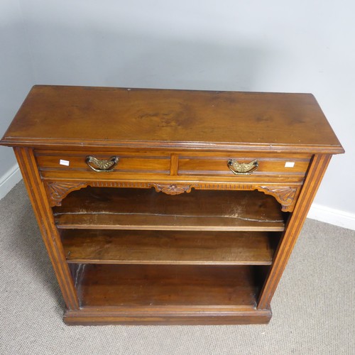 474 - An Edwardian mahogany open Bookcase, two short frieze drawers over two open shelves, raised on plint... 