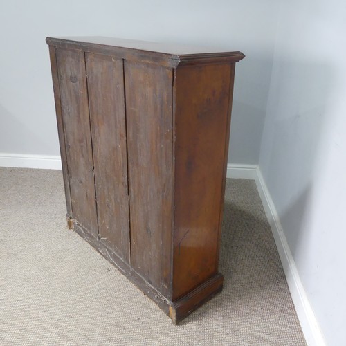 474 - An Edwardian mahogany open Bookcase, two short frieze drawers over two open shelves, raised on plint... 