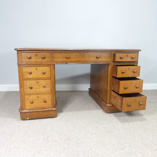 496 - A good late 19th century oak twin pedestal Desk, rectangular top inset with gilt tooled leather skiv... 