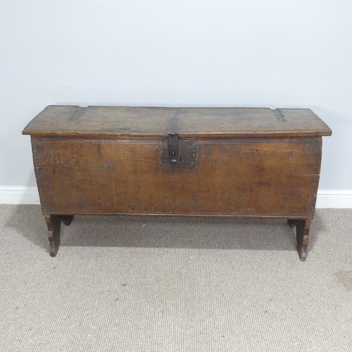 498 - An 18th century oak Coffer, rectangular top with replacement hinges, raised on end supports, W 131 c... 