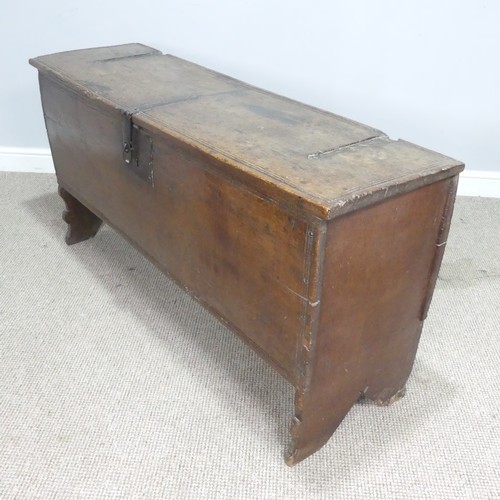 498 - An 18th century oak Coffer, rectangular top with replacement hinges, raised on end supports, W 131 c... 