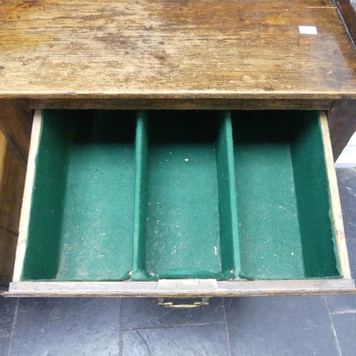 503 - A George III oak Dresser with plate rack, moulded cornice over frieze with hooks, above three panel ... 