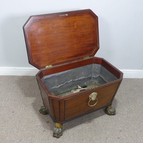 505 - A Georgian mahogany sarcophagus wine Cooler, of small proportions, octagonal reeded hinged top over ... 