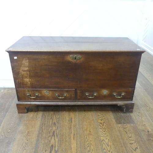 507 - An early Georgian oak mule Chest, rectangular top over two drawers raised on bracket feet, W 124 cm ... 