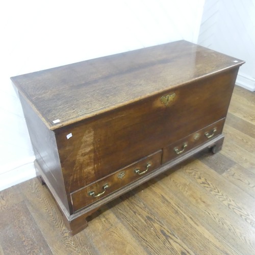 507 - An early Georgian oak mule Chest, rectangular top over two drawers raised on bracket feet, W 124 cm ... 