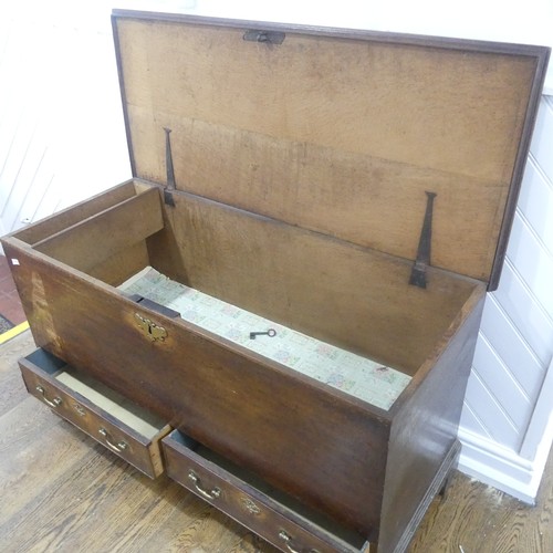 507 - An early Georgian oak mule Chest, rectangular top over two drawers raised on bracket feet, W 124 cm ... 