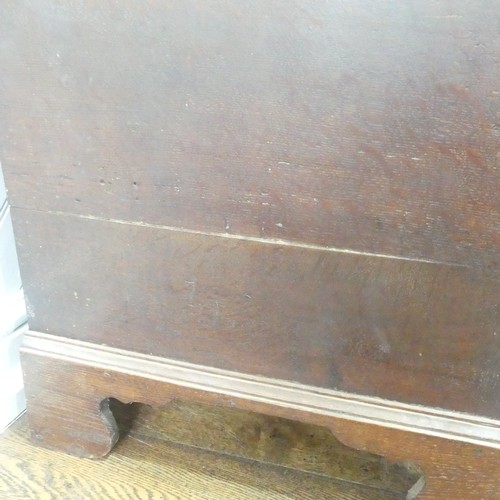 507 - An early Georgian oak mule Chest, rectangular top over two drawers raised on bracket feet, W 124 cm ... 