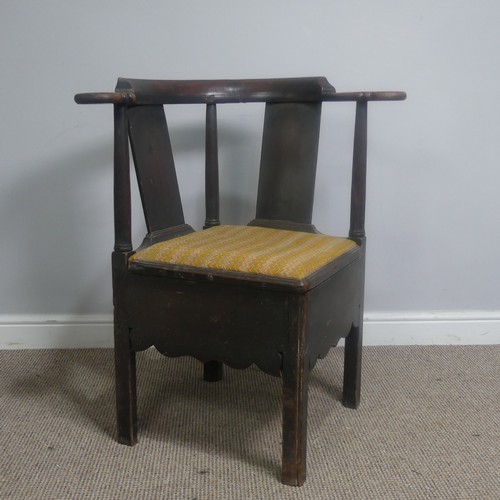 508 - A Georgian mahogany corner elbow Chair, raised on square supports, W 76 cm x H 83.5 cm x D 62 cm.... 