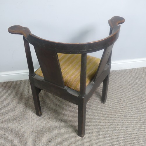 508 - A Georgian mahogany corner elbow Chair, raised on square supports, W 76 cm x H 83.5 cm x D 62 cm.... 