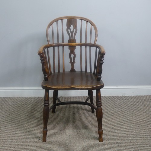 511 - A set of six 19th century ash and elm Windsor Armchairs, spindle and pierced splat backs over shaped... 