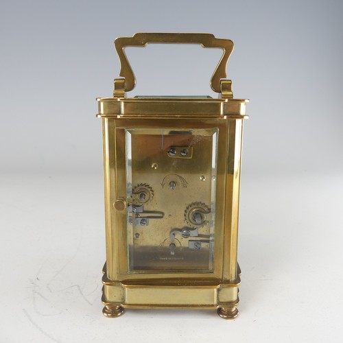 387 - A 20th century French alarm carriage Clock, enamelled white dial with Roman numerals and subsidiarie... 