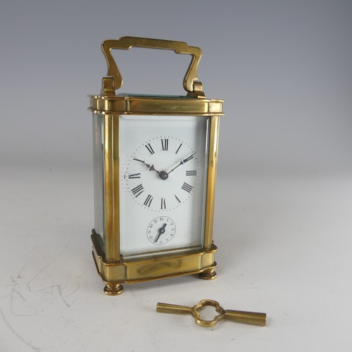 387 - A 20th century French alarm carriage Clock, enamelled white dial with Roman numerals and subsidiarie... 