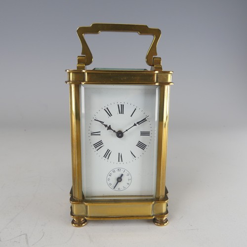 387 - A 20th century French alarm carriage Clock, enamelled white dial with Roman numerals and subsidiarie... 