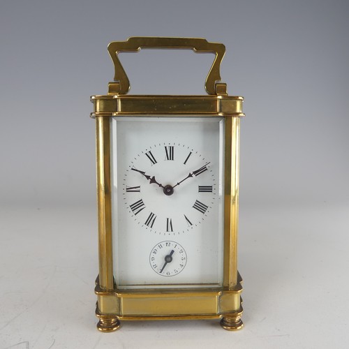 387 - A 20th century French alarm carriage Clock, enamelled white dial with Roman numerals and subsidiarie... 