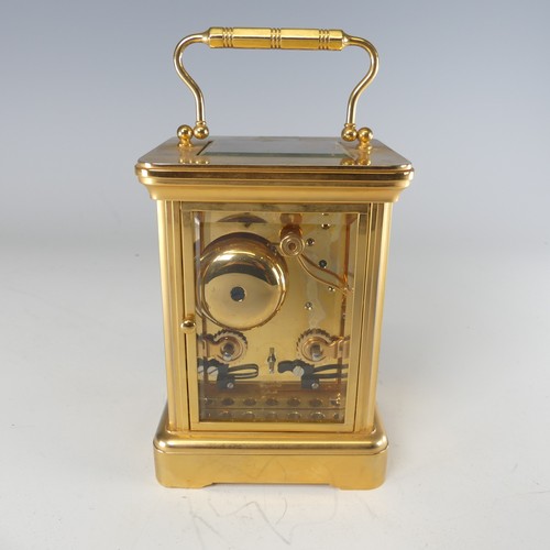 388 - An early 20th century English striking carriage Clock, by Morrell & Hilton, the white enamelled ... 