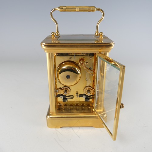 388 - An early 20th century English striking carriage Clock, by Morrell & Hilton, the white enamelled ... 