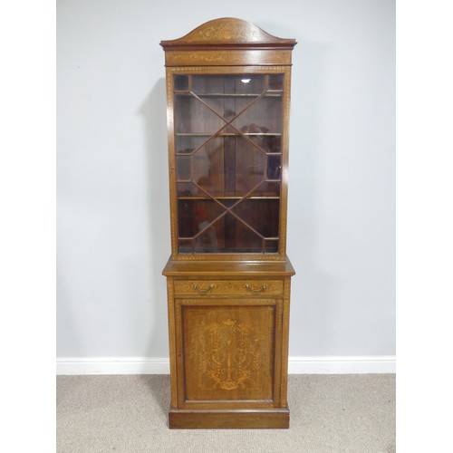 517 - An Edwardian mahogany and inlaid glazed display Cabinet, arched inlaid top over astragal glazed door... 