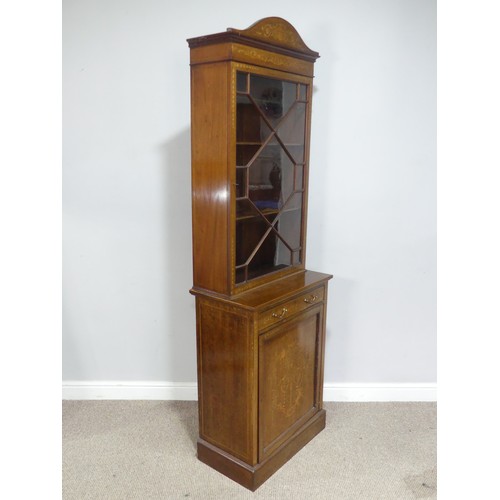 517 - An Edwardian mahogany and inlaid glazed display Cabinet, arched inlaid top over astragal glazed door... 