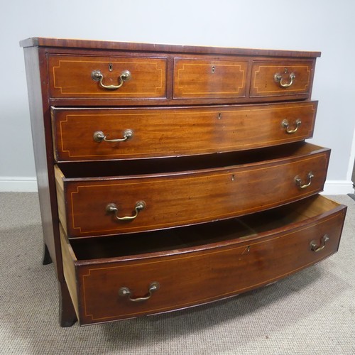 521 - A Georgian mahogany bow-front Chest of drawers, three small drawers over three long graduating drawe... 