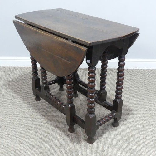 536 - A small 18th century oak gateleg circular Table, raised on turned bobbin supports, W 99 cm x H 73 cm... 