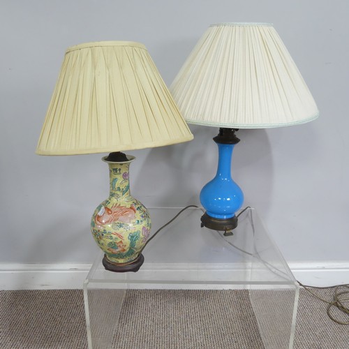 549 - Three early 20thC oil lamps, now converted to electricity, together with two ceramic based table lam... 