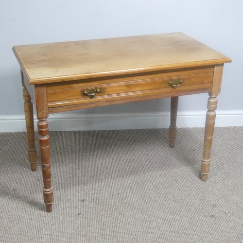 556 - An early 20th century light oak Side Table, with frieze drawer, raise on turned supports, W 92 cm x ... 