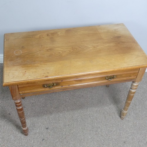 556 - An early 20th century light oak Side Table, with frieze drawer, raise on turned supports, W 92 cm x ... 