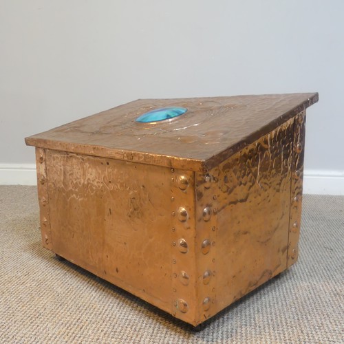 525 - An Arts and Crafts copper fireside / log Box, sloped hinge top with very large central cabochon / ru... 