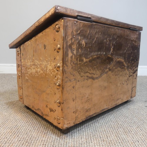 525 - An Arts and Crafts copper fireside / log Box, sloped hinge top with very large central cabochon / ru... 